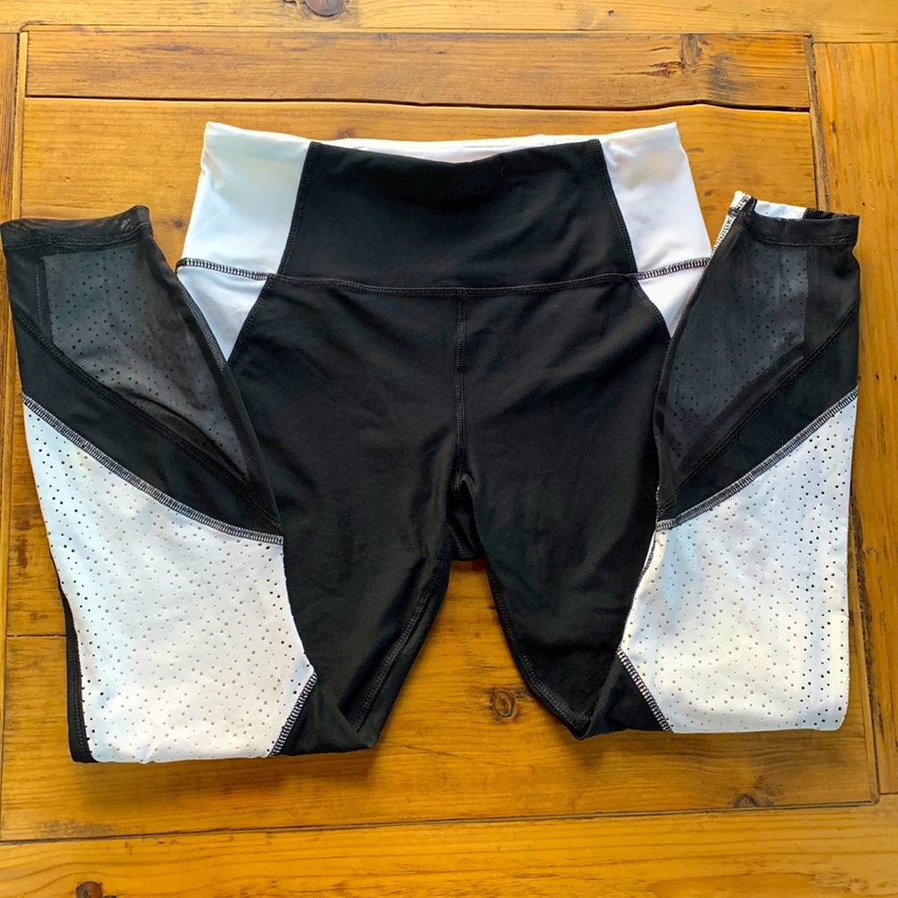 Reebok size Medium black/white tights with some mesh
